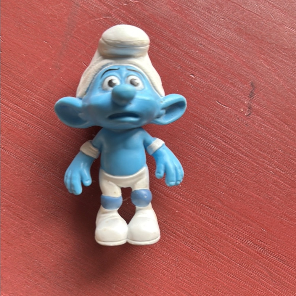 Blue and White Smurf Figurine